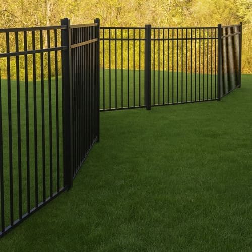 Technician installing aluminum pool fence to meet local safety code, H&J Fence Supply Company